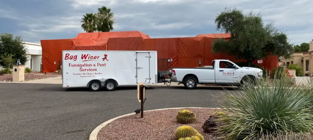 bug wiser fumigation tent set up on a house