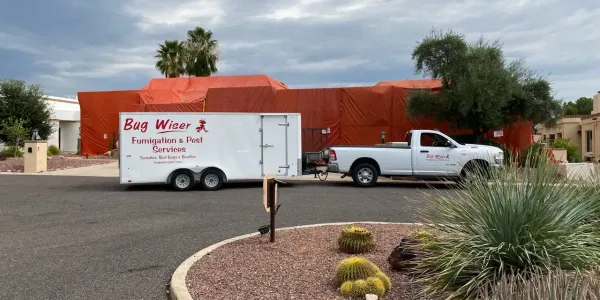bug wiser fumigation tent set up on a house